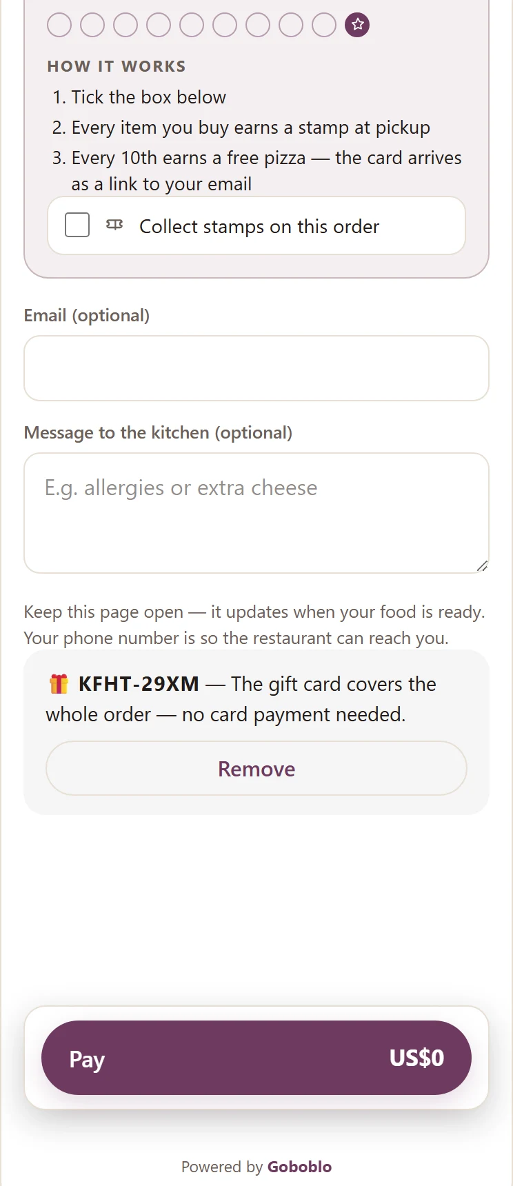 The ordering checkout on a phone: gift card KFHT-29XM covers the whole order — no card payment needed, and the pay button shows US$0 — the demo venue's real checkout flow