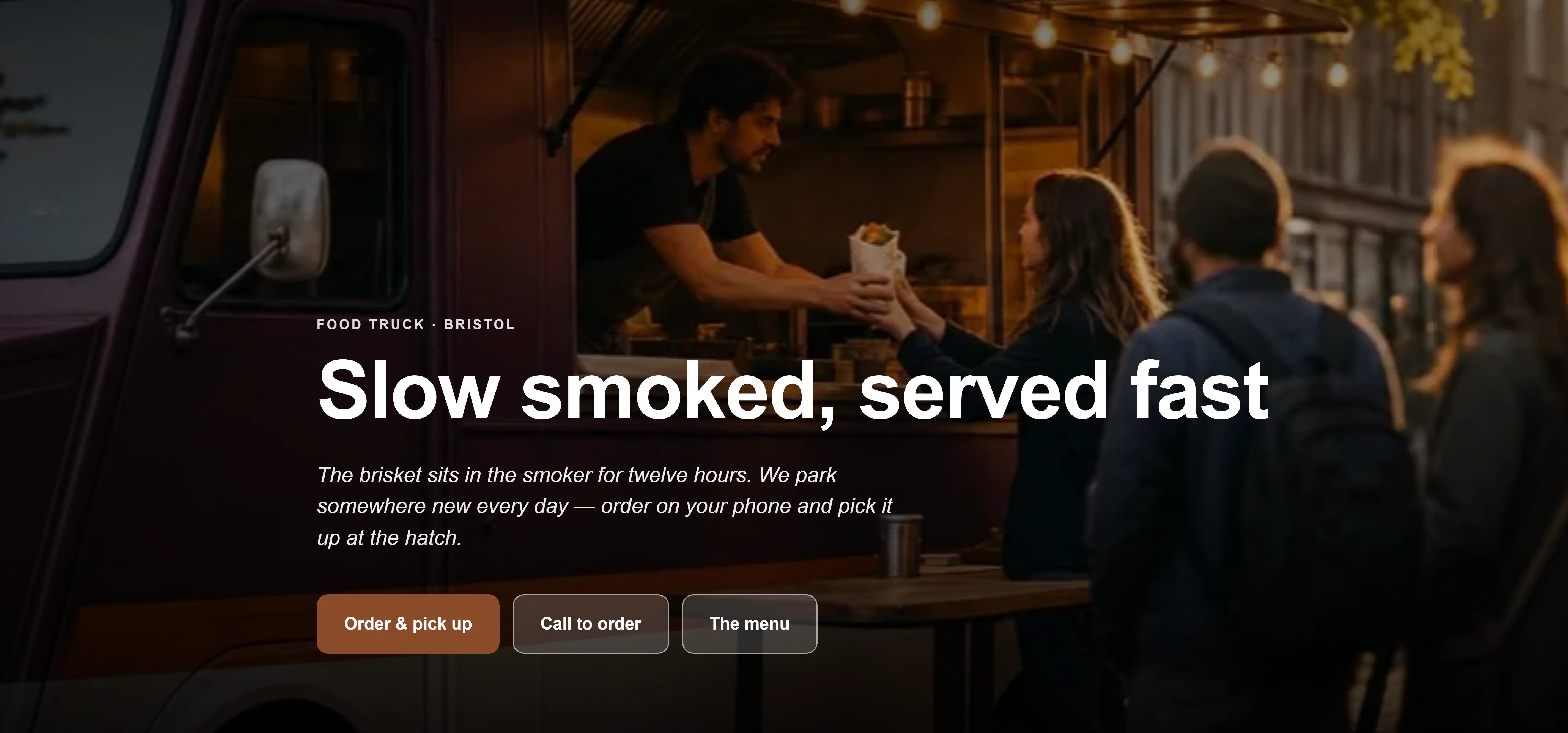 The front page of the food truck The Smokehouse's site, built by Goboblo, in English: the name, the line Slow smoked, served fast, an Order now button and the opening hours