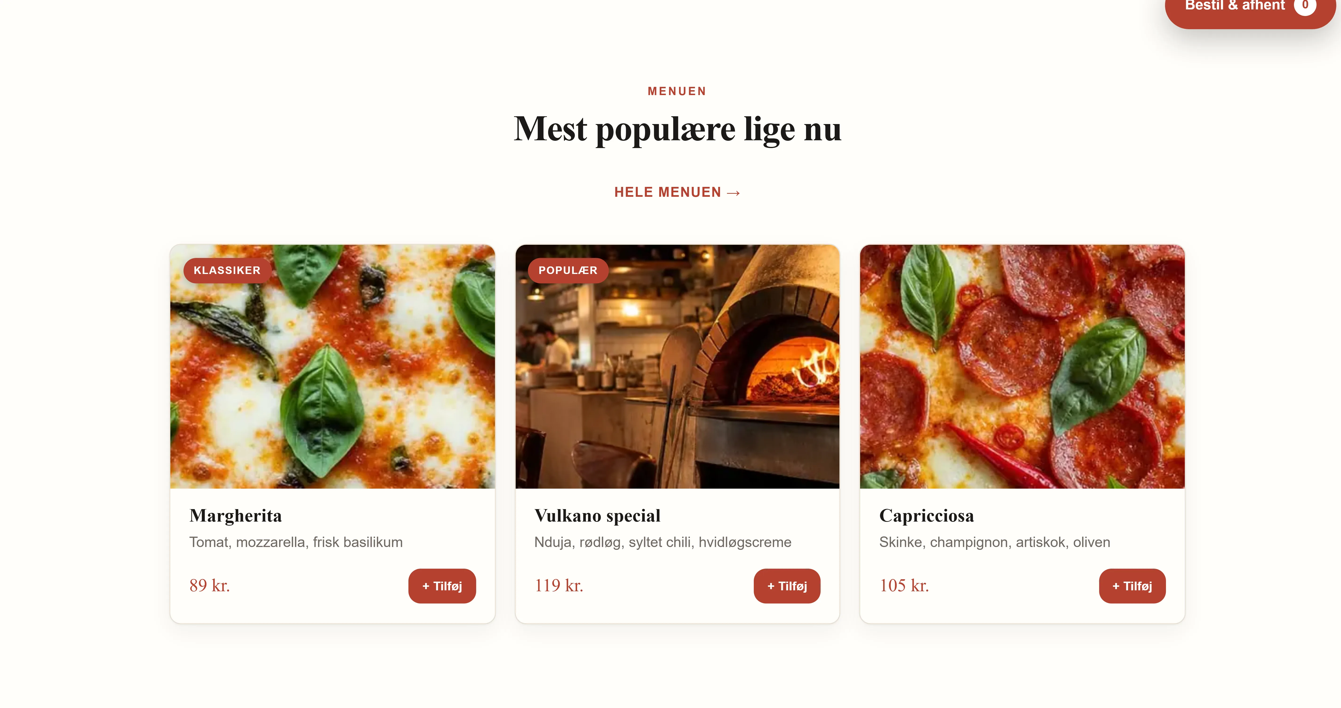 Menuen på pizzeriaet Vulkanos side, bygget af Goboblo, på dansk: Margherita 89 kr, Vulkano special 119 kr og Capricciosa 105 kr med billeder og Læg i kurv-knapper