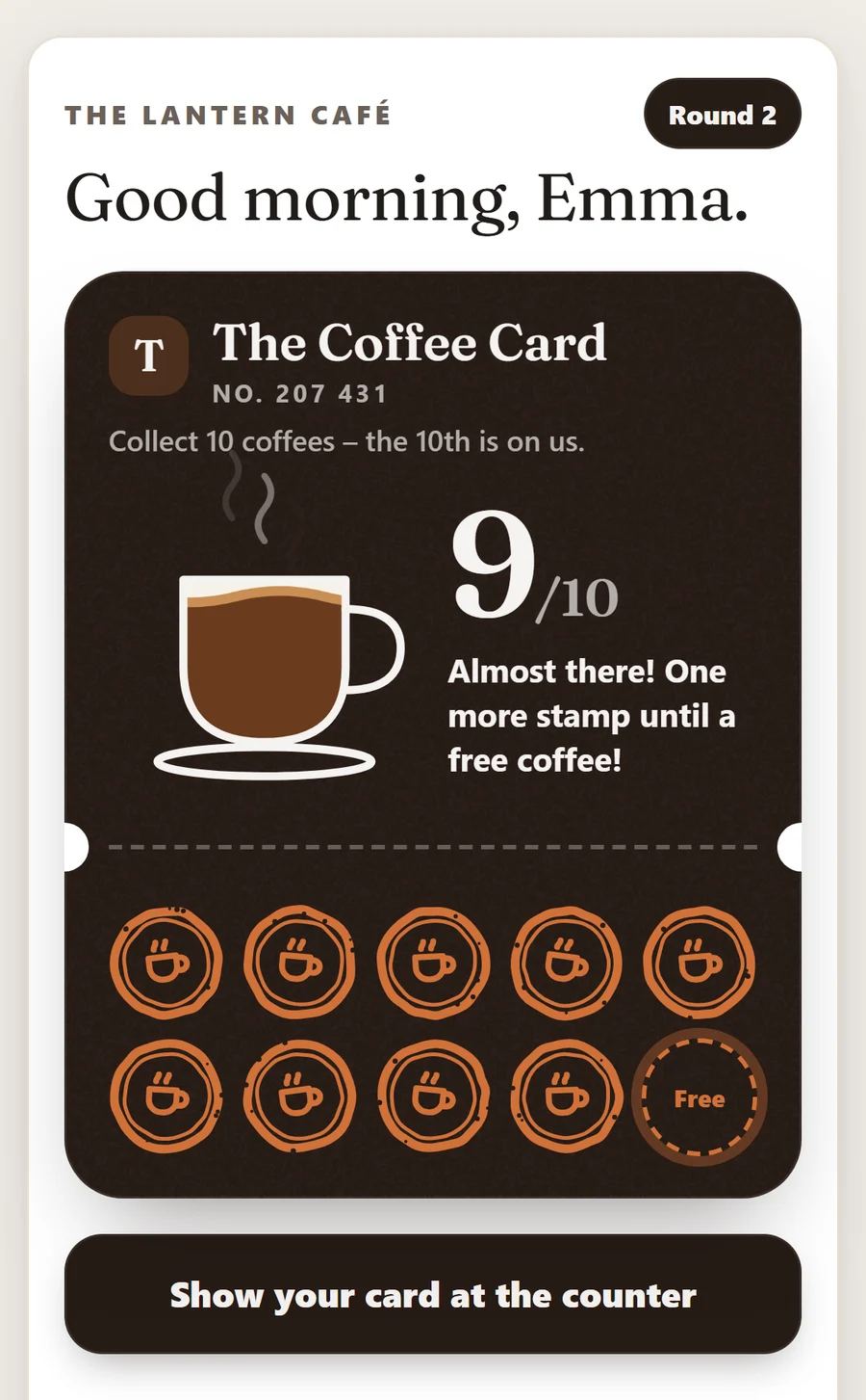 The stamp card on the guest's phone at The Lantern Café is almost full: the cup is filled to 9 of 10 stamps, one more to a free coffee