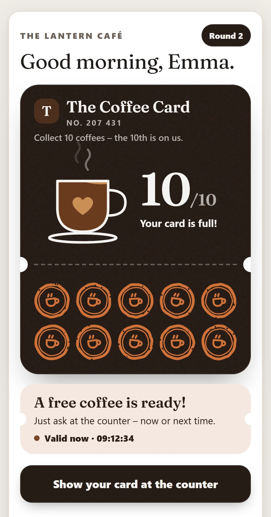 A full stamp card on the guest's phone: ten of ten stamps and a ticket for a free coffee, shown at the counter.